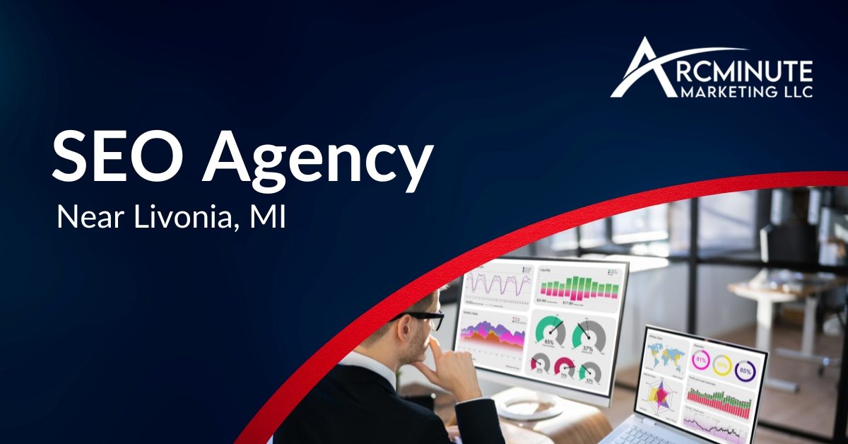 A Man Thinking Sitting In Front of Two Computers With Bars and Graphs | SEO Agency Near Livonia, MI | Arcminute Marketing